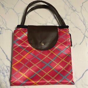 NWOT’s- 2 Collapsable plastic Totes W/handles. They are both the same size,